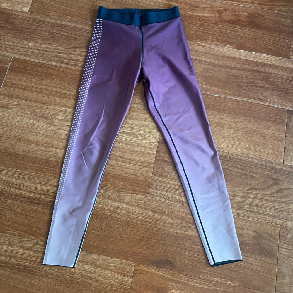 Ultra core leggings size medium. Eggplant ombré with star stripes.